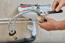 Plumber installing braided pipe for residential plumbing in South Africa