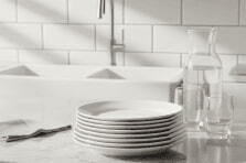 Dining set plates displayed in a kitchen for home use in South Africa