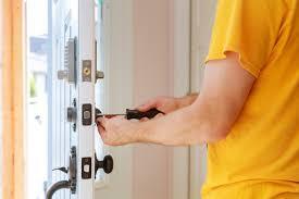 Man installing mortice locks for home security in Randburg